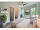 Bedroom featuring neutral tones, ample natural light, and an ensuite bathroom at 1994 Freestone Way, Marietta, GA 30064