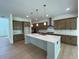 Spacious kitchen with an island, stainless steel appliances, and ample cabinet space at 1994 Freestone Way, Marietta, GA 30064