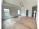 Spacious main bedroom with tray ceiling, natural light, and ensuite access at 1994 Freestone Way, Marietta, GA 30064
