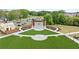 Aerial view of the Piedmont Bank Amphitheater with lawn and sidewalks, parking and mature trees at 2110 Prichard Park Dr, Kennesaw, GA 30144