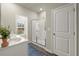 Well-lit bathroom with double vanity, framed mirror, and a glass-enclosed shower for a modern, clean aesthetic at 2110 Prichard Park Dr, Kennesaw, GA 30144
