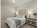 Comfortable bedroom with natural light, neutral walls, soft carpet, and a modern ceiling fan at 2110 Prichard Park Dr, Kennesaw, GA 30144
