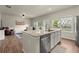 Open kitchen seamlessly connected to the living area, creating a spacious and inviting atmosphere at 2110 Prichard Park Dr, Kennesaw, GA 30144