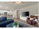 Open-concept living area flowing into a modern kitchen, perfect for entertaining at 2110 Prichard Park Dr, Kennesaw, GA 30144