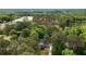 Aerial view of a home surrounded by mature trees on a large lot at 2805 Pineland Ave, Atlanta, GA 30340