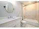 Modern bathroom featuring a vanity with quartz countertop and tiled shower and tub at 2805 Pineland Ave, Atlanta, GA 30340