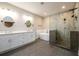 Bathroom featuring a walk-in shower, soaking tub, and double sink vanity at 2805 Pineland Ave, Atlanta, GA 30340