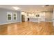 Open-concept kitchen with stainless steel appliances, white cabinets, and large island at 2805 Pineland Ave, Atlanta, GA 30340