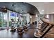 Well-equipped gym with cardio machines and city views for a great workout experience at 3324 Peachtree Rd # 1719, Atlanta, GA 30326