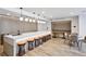 Modern kitchen with barstool seating and a cozy dining area for casual meals at 3324 Peachtree Rd # 1719, Atlanta, GA 30326