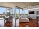Bright and open living room with a dining area, modern furniture, and floor-to-ceiling windows with great views at 3324 Peachtree Rd # 1719, Atlanta, GA 30326