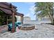 Outdoor seating around a fire pit on the rooftop patio with city views at 3324 Peachtree Rd # 1719, Atlanta, GA 30326