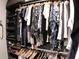 Walk-in closet featuring shelving and hanging storage for clothes and shoes at 3630 Deaton Trl, Buford, GA 30519