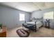 Cozy bedroom with carpet, complemented by a queen bed and matching blue decor at 1602 Shamrock Se Trl, Smyrna, GA 30080