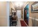 Entryway featuring tiled floors, chandelier, and doorway to formal living and dining areas at 1602 Shamrock Se Trl, Smyrna, GA 30080