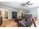 Spacious living room with comfortable seating, entertainment center, and natural light at 1602 Shamrock Se Trl, Smyrna, GA 30080