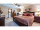 Comfortable main bedroom boasts a large bed, wooden furnishings, and an ensuite bathroom at 1602 Shamrock Se Trl, Smyrna, GA 30080