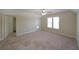 Spacious bedroom featuring natural light, neutral paint, and large closet for ample storage at 2651 Old Lost Mountain Rd, Powder Springs, GA 30127