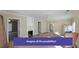 Bright living room featuring neutral walls, fireplace, and ample space for seating at 2651 Old Lost Mountain Rd, Powder Springs, GA 30127