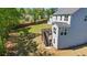 View of fenced in backyard with a wooden deck attached to the home at 312 Wichita Way, Mcdonough, GA 30253