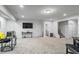 Finished basement with entertainment and media space, and access to bathroom at 312 Wichita Way, Mcdonough, GA 30253