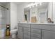 Bathroom featuring double vanity, modern fixtures, and shower with tub at 312 Wichita Way, Mcdonough, GA 30253