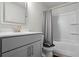 Neutral bathroom featuring vanity, contemporary faucet, and shower with tub at 312 Wichita Way, Mcdonough, GA 30253