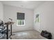 Bedroom with natural light, a work desk, and door to backyard area at 312 Wichita Way, Mcdonough, GA 30253