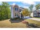 Two-story brick home with manicured lawn, landscaping and bright blue skies at 312 Wichita Way, Mcdonough, GA 30253