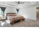 Spacious main bedroom with tray ceiling and lots of natural light at 312 Wichita Way, Mcdonough, GA 30253