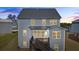 Home exterior features a walk-out deck and backyard at 312 Wichita Way, Mcdonough, GA 30253