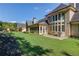 Spacious backyard with well-maintained lawn, perfect for outdoor activities and entertaining guests at 5004 Gunnison Trce, Suwanee, GA 30024
