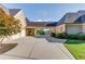 Attached garage with ample parking space and a well-maintained driveway at 5004 Gunnison Trce, Suwanee, GA 30024
