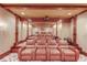 Spacious home theater with leather recliners and tiered seating for optimal viewing at 5004 Gunnison Trce, Suwanee, GA 30024