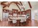 Gourmet kitchen with custom cabinetry, stainless steel appliances, large central island and a breakfast bar at 5004 Gunnison Trce, Suwanee, GA 30024