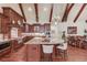 Gourmet kitchen with custom cabinetry, stainless steel appliances, large central island and seating at 5004 Gunnison Trce, Suwanee, GA 30024