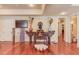 Bright living area with hardwood floors, stylish decor, and ample space for entertaining at 5004 Gunnison Trce, Suwanee, GA 30024