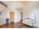 Spacious living room featuring hardwood floors and a seating area at 5004 Gunnison Trce, Suwanee, GA 30024