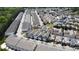 Aerial view of a neighborhood with well-maintained homes and green spaces at 690 Stickley Oak Way, Woodstock, GA 30189