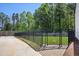 Fully fenced dog park, featuring a mix of wooden and metal fencing, offering a secure and attractive space for pets and their owners at 690 Stickley Oak Way, Woodstock, GA 30189