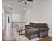 Upstairs living room featuring a large sofa and natural light at 690 Stickley Oak Way, Woodstock, GA 30189