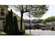 Charming street view showcases well-maintained homes, lush landscaping, and a welcoming neighborhood ambiance at 690 Stickley Oak Way, Woodstock, GA 30189