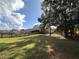 Lush backyard featuring a well-kept lawn and secure fencing at 200 Suffolk Way, Mcdonough, GA 30252