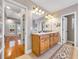 Spacious bathroom featuring double sinks, granite countertops, and ample storage with a light and airy feel at 200 Suffolk Way, Mcdonough, GA 30252