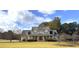 Lovely two-story home featuring a spacious front yard and classic architectural details at 200 Suffolk Way, Mcdonough, GA 30252