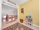 Charming upstairs hallway with a view of the staircase, decor, and a vintage dollhouse at 200 Suffolk Way, Mcdonough, GA 30252