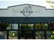 Exterior shot of Noona Oysters featuring a modern facade and large windows at 2872 Evanshire Ave # 116, Duluth, GA 30096
