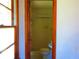 Bathroom featuring a toilet and a window allowing natural light at 5542 Joeclay Dr, Stone Mountain, GA 30088