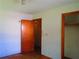 Bedroom featuring hardwood floors, closet, and natural light at 5542 Joeclay Dr, Stone Mountain, GA 30088