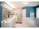 Elegant bathroom with double vanity, stand alone shower, and a luxurious soaking tub at 1030 E Lakehaven Way, Mcdonough, GA 30253